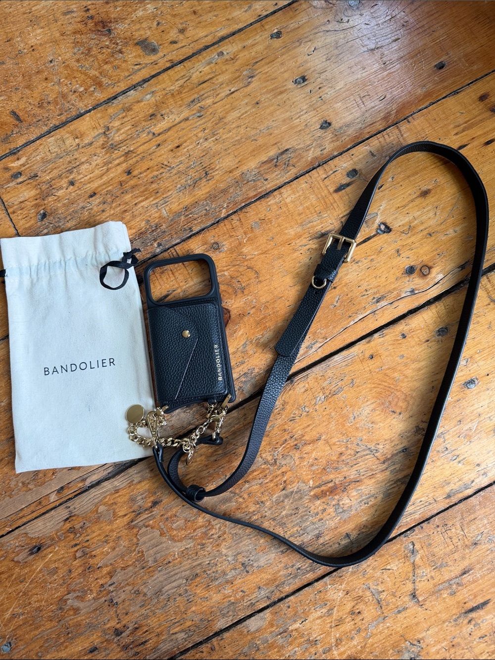 Bandolier Remi Black Leather Crossbody Phone Case with charm wristlet